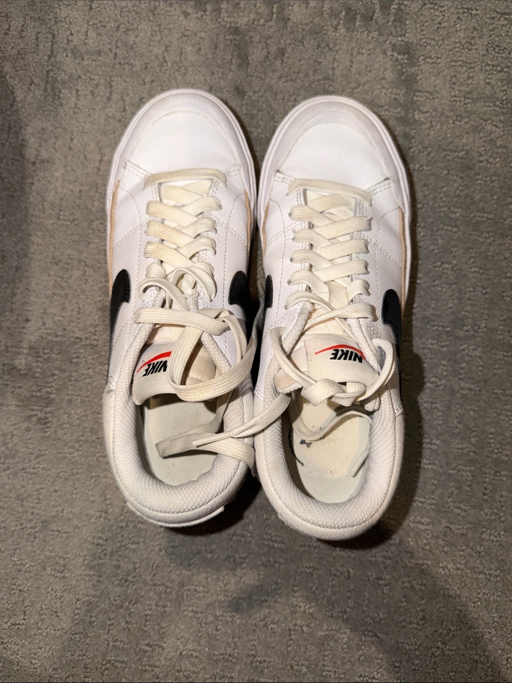 Nike White Platform Soles Low-Top Sneakers with Black Swoosh and Red Tongue Logo